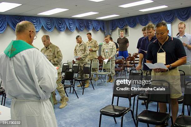 Camp As Saliyah. Celebrating mass at the American Military Central Command . As Saliyah is the U.S. Army's largest pre-positioning base outside of...