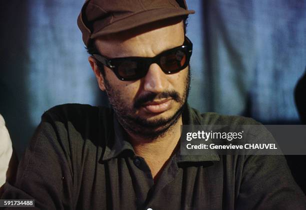 Palestine Liberation Organization leader Yasser Arafat attends a press conference in Jordan where he set up Palestinian refugee camps and bases for...