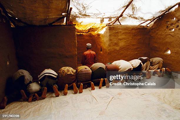 Sudanese border, Refugees praying inside Kakuma camp.