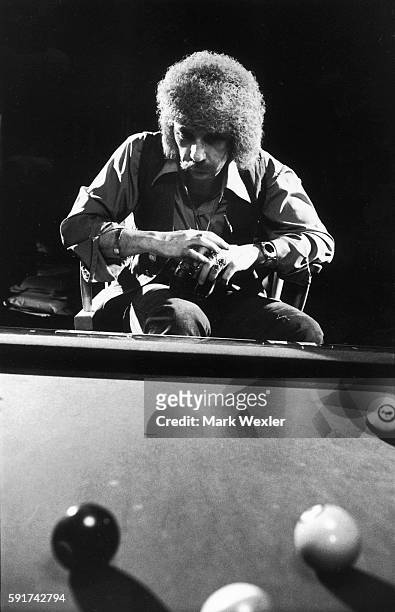 Rock & Roll songwriter and record producer, Phil Spector, sits pensively by his pool table. On February 3 Phil Spector, age 62, known for his...
