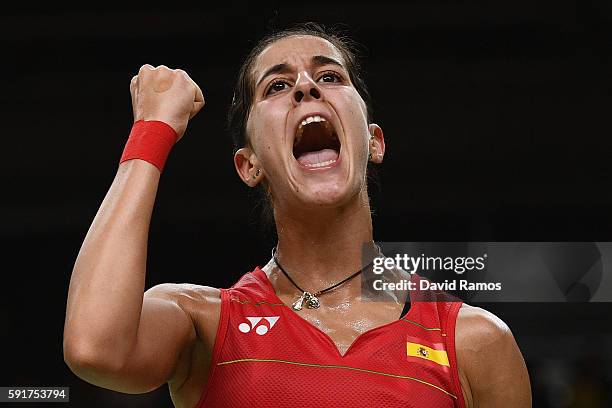 Carolina Marin of Spain celebrates winning a point against Xuerui Li of China during the Women's Badminton Singles Semifinal Match between Carolina...