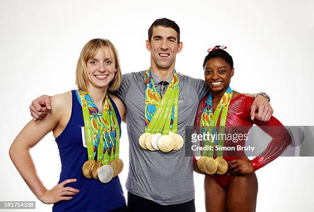 Swimming and Gymnastics: 2016 Summer Olympics: Portrait of Team USA swimmers Katie Ledecky, Michael Phelps, and gymnast Simone Biles posing with...