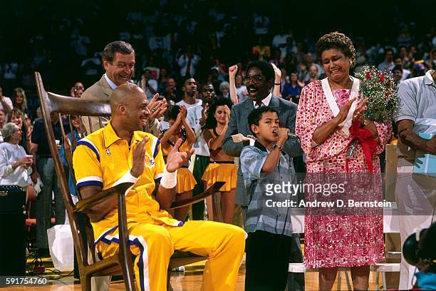 Kareem Abdul-Jabbar of the Los Angeles Lakers sits in a big rocking chair before his last game against the Seattle SuperSonics on April 23, 1989 at...