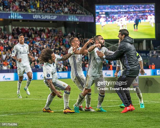 Real Madrid players Marco Asensio, Raphael Varane, Marcelo, Lucas Vazquez, Dani Carvajal,Alvaro Morata, Sergio Ramos celebrate goal and victory with...