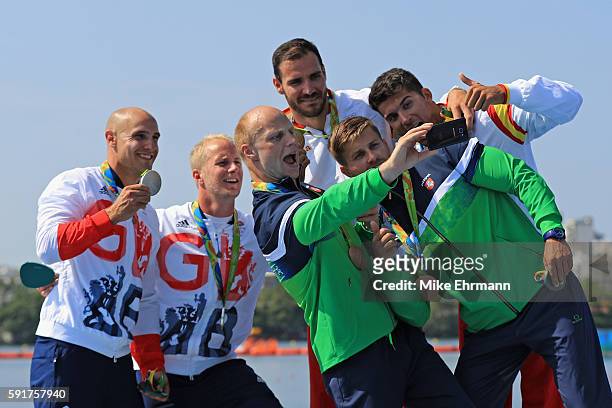 Silver medalists Liam Heath and Jon Schofield of Great Britain, gold medalists Saul Craviotto and Cristian Toro of Spain and bronze medalist Aurimas...