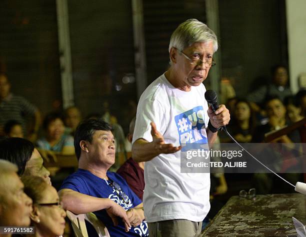 Alan Jasminez , one of the communist rebel peace consultants who were recently released from prison, answers a question from members of the media...