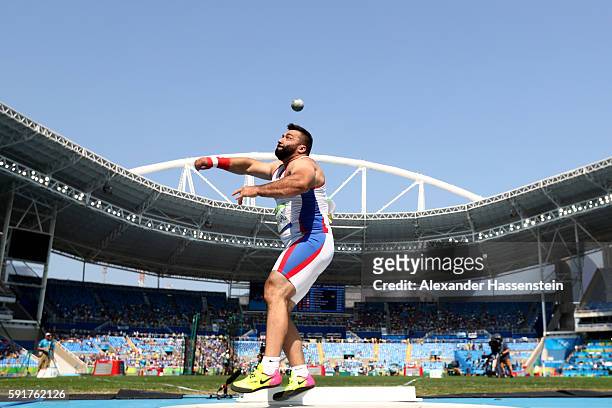Asmir Kolasinac of Serbia competes in Men's Shot Put Qualifying on Day 13 of the Rio 2016 Olympic Games at the Olympic Stadium on August 18, 2016 in...
