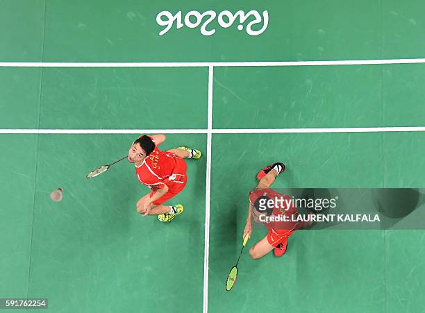 An overview shows China's Chai Biao and China's Hong Wei returns against Great Britain's Marcus Ellis and Great Britain's Chris Langridge during...