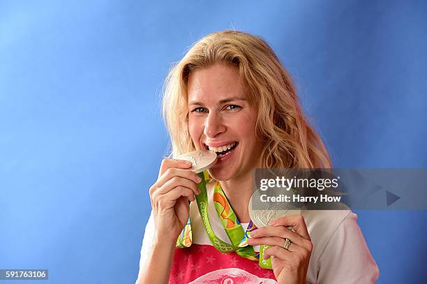 Cyclist, Sarah Hammer of the United States poses for a photo with her two silver medals on the Today show set on Copacabana Beach on August 17, 2016...