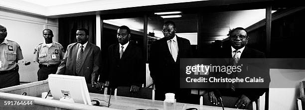 The accused appear in the courtroom. : Colonel Theoneste Bagosora, generally considered as the "brainchild" behind the Rwandan genocide, Lieutenant...