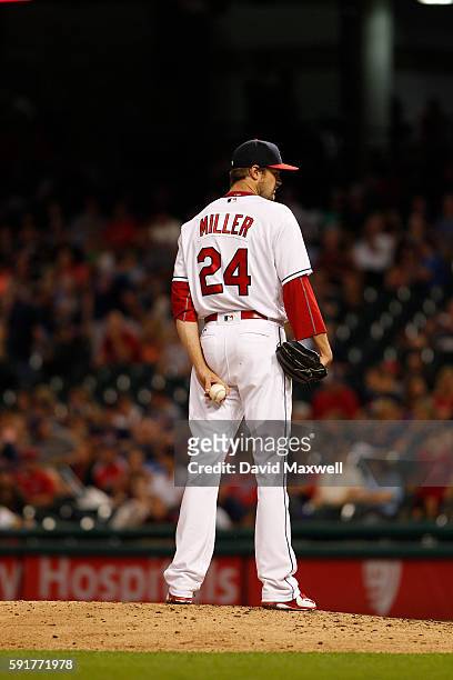 Andrew Miller of the Cleveland Indians pitches against the Los Angeles Angels of Anaheim during the eighth inning at Progressive Field on August 13,...