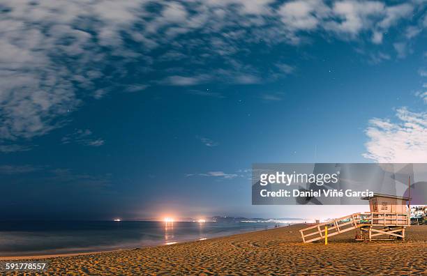 malibu beach at night - malibu foto e immagini stock