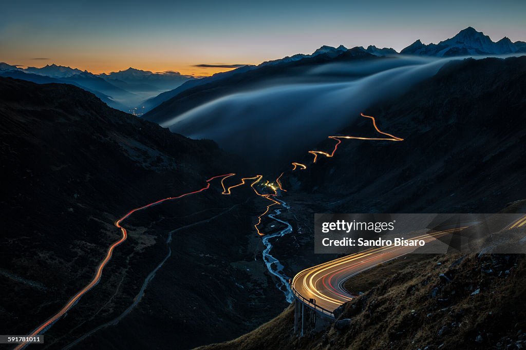 Mountain roads at sunset with traffic lights