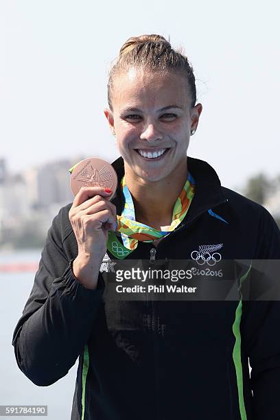 Bronze medalist Lisa Carrington of New Zealand stands on the podium during the medal ceremony for the Women's Kayak Single 500m event at the Lagoa...
