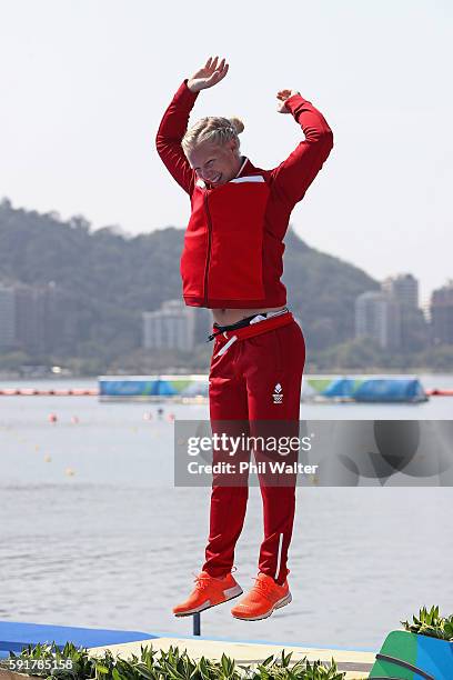 Silver medalist Emma Jorgensen of Denmark celebrates on the podium during the medal ceremony for the Women's Kayak Single 500m event at the Lagoa...