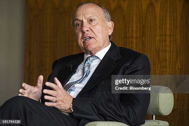 Christo Wiese, billionaire and chairman of Steinhoff Holdings NV, gestures whilst speaking during a Bloomberg Television interview at the Pepkor...