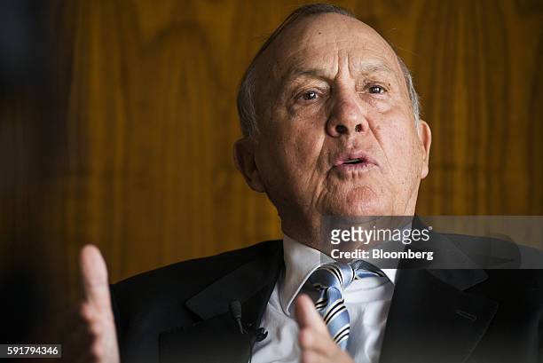 Christo Wiese, billionaire and chairman of Steinhoff Holdings NV, gestures whilst speaking during a Bloomberg Television interview at the Pepkor...