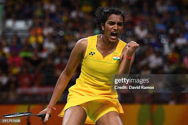 Pusarla V Sindhu of India celebrates winning a point during the Women's Badminton Singles Semi-final against Nozomi Okuhara of Japan on Day 13 of the...