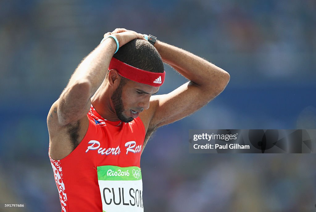 Culson Javier Culson of Puerto Rico reacts after being disqualified in the ...