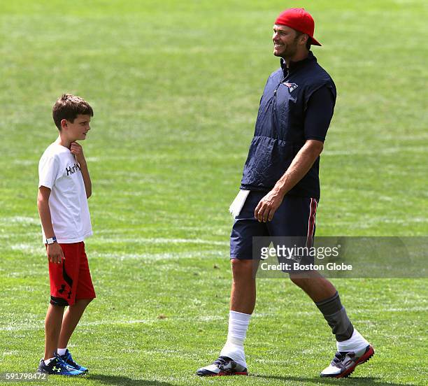 New England Patriots quarterback Tom Brady with his son, John Edward Thomas Moynahan, after today's joint practice with the Chicago Bears. The New...