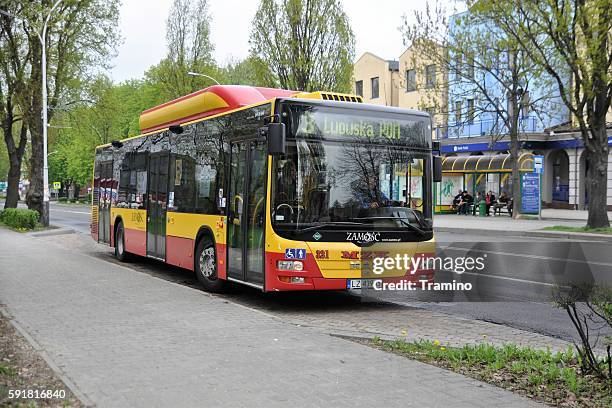 man lion's city cng bus on the street - natural gas bus stock pictures, royalty-free photos & images