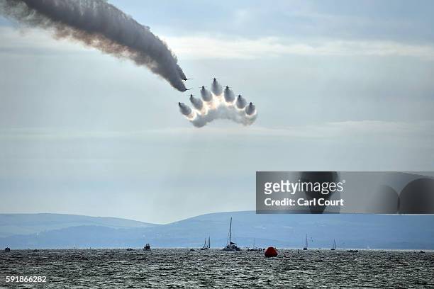 The Red Arrows aerobatics display team perform during the Bournemouth Air Festival on August 18, 2016 in Bournemouth, England. The air show runs from...