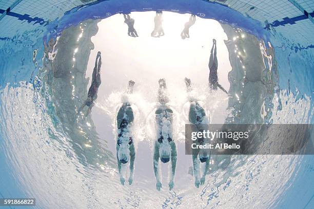 The team of Japan enter the pool during a warm up prior to the Synchronised Swimming Teams Technical Routine at the Maria Lenk Aquatics Centre on Day...