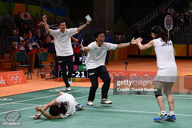 Misaki Matsutomo and Ayaka Takahashi of Japan celebrate winning match point against Christinna Pedersen and Kamilla Rytter Juhl of Denmark during the...