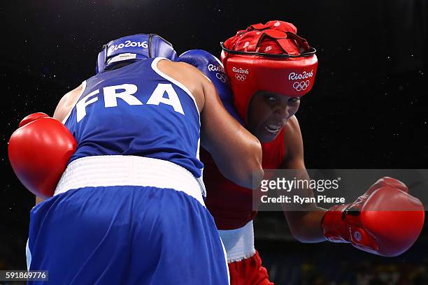 Ingrit Lorena Valencia Victoria of Colombia fights against Sarah Ourahmoune of France during a Women's Fly Semifinal bout on Day 13 of the 2016 Rio...