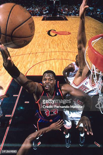 Patrick Ewing of th New York Knicks shoots the ball during Round One of the NBA Eastern Conference Playoffs against the Miami Heat on May 16, 1999 at...