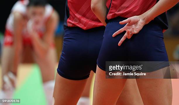 United States player calls a play while taking on Serbia in the Women's Volleyball Semifinal match at the Maracanazinho on Day 13 of the 2016 Rio...