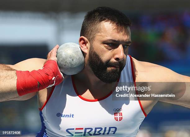 Asmir Kolasinac of Serbia competes in Men's Shot Put Qualifying on Day 13 of the Rio 2016 Olympic Games at the Olympic Stadium on August 18, 2016 in...