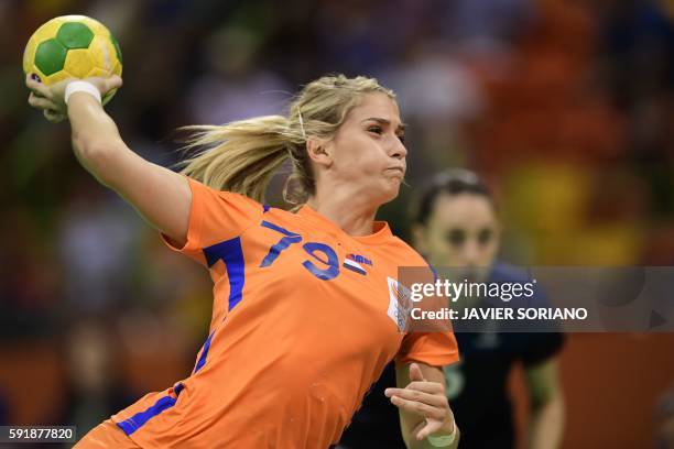 Netherlands' left back Estavana Polman shoots during the women's semifinal handball match Netherlands vs France for the Rio 2016 Olympics Games at...