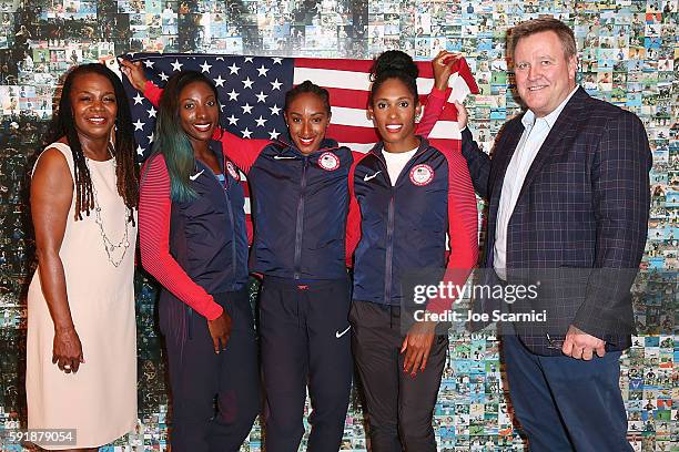 Executive Board Member Stephanie Hightower, U.S. Olympians Nia Ali, Brianna Rollins and Kristi Castlin and USOC CEO Scott Blackmun pose for a photo...