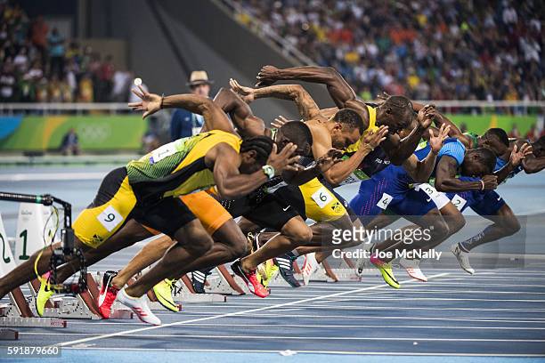Summer Olympics: View of Jamaica Usain Bolt and competitors in action at starting block during Men's 100M Final at the Olympic Stadium. Rio de...