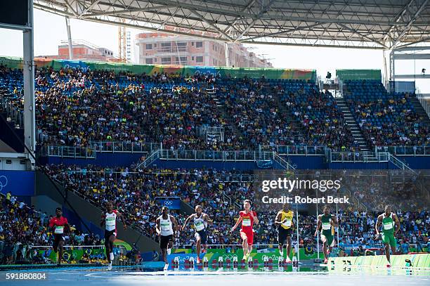 Summer Olympics: Jamaica Yohan Blake, China Peimeng Zhang and South Africa Henricho Bruintjies in action during Men's 100M at Olympic Stadium. Rio de...