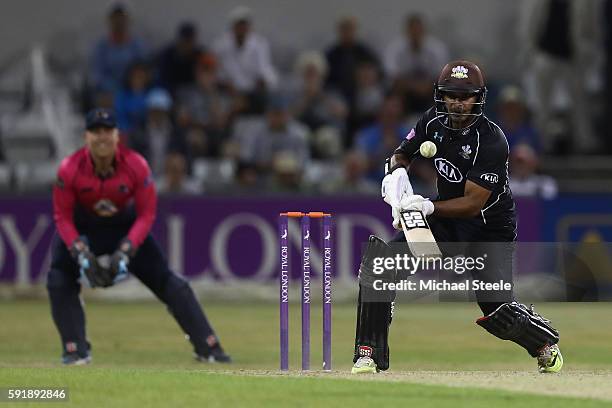 Kumar Sangakkara of Surrey hits a reverse sweep for six off the bowling of Mohammad Azharullah of Northants during the Royal London One-Day Cup...