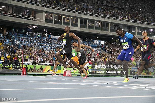 Summer Olympics: Jamaica Usain Bolt and USA Justin Gatlin in action during Mens 100M Final at Rio Olympic Stadium. Bolt wins gold. Gatlin wins...