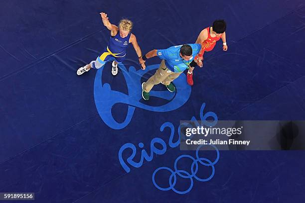 Sofia Magdalena Mattsson of Sweden celebrates after defeating Xuechun Zhong of China during the Women's Freestyle 53 kg Bronze medal match on Day 13...