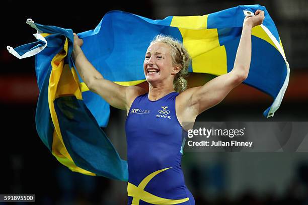 Sofia Magdalena Mattsson of Sweden celebrates after defeating Xuechun Zhong of China during the Women's Freestyle 53 kg Bronze medal match on Day 13...