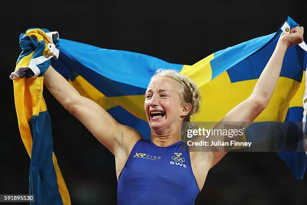 Sofia Magdalena Mattsson of Sweden celebrates after defeating Xuechun Zhong of China during the Women's Freestyle 53 kg Bronze medal match on Day 13...