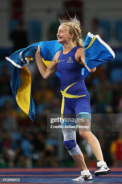 Sofia Magdalena Mattsson of Sweden celebrates after defeating Xuechun Zhong of China during the Women's Freestyle 53 kg Bronze medal match on Day 13...