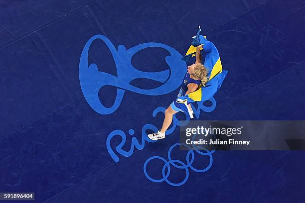 Sofia Magdalena Mattsson of Sweden celebrates after defeating Xuechun Zhong of China during the Women's Freestyle 53 kg Bronze medal match on Day 13...