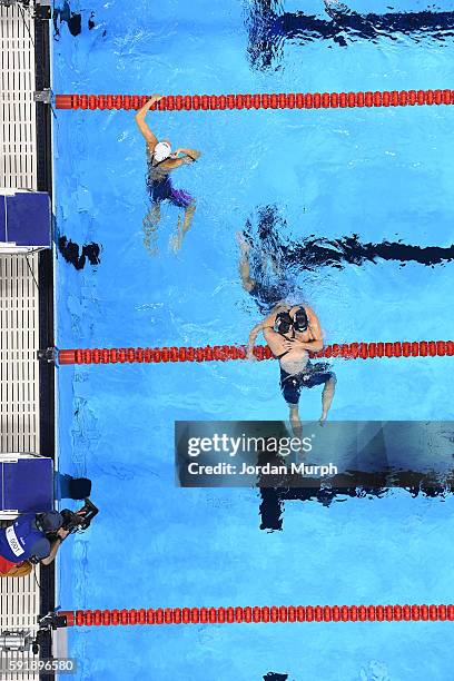 Summer Olympics: Aerial view of USA Katie Ledecky victorious with Hungary Boglarka Kapas after finishing Women's 800M Freestyle Final at the Olympic...