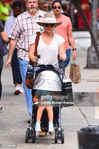 Hilary Duff and her son Luca Cruz Comrie seen out in Manhattan on August 18, 2016 in New York City.