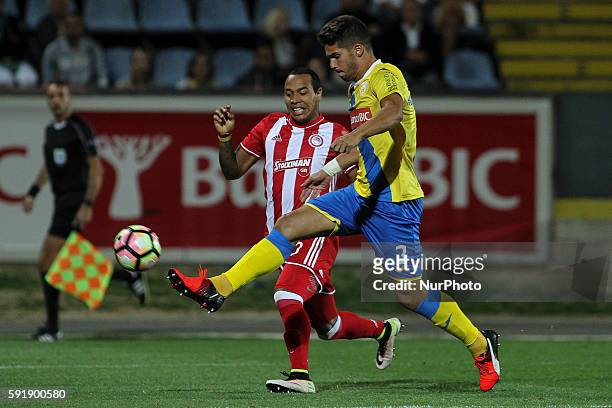 Olympiaco's Colombian forward Felipe Pardo with Arouca's Portuguese defender Hugo Bastos in action during the UEFA Europa League 2016/17 match...