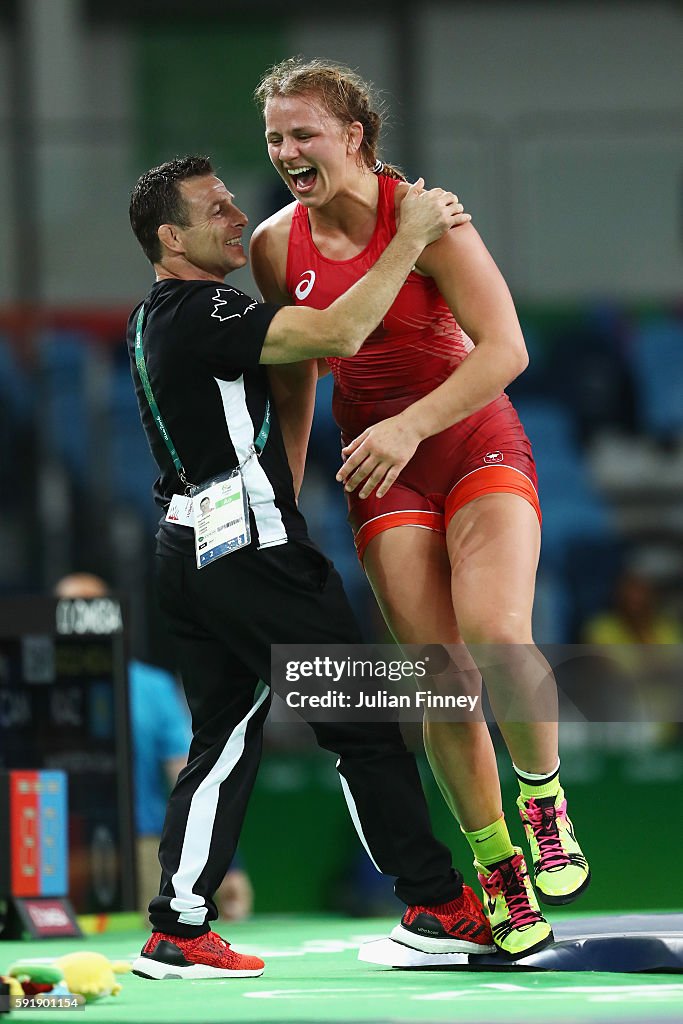 Paul Ragusa Erica Elizabeth Wiebe of Canada celebrates with coach Paul Ragusa ...
