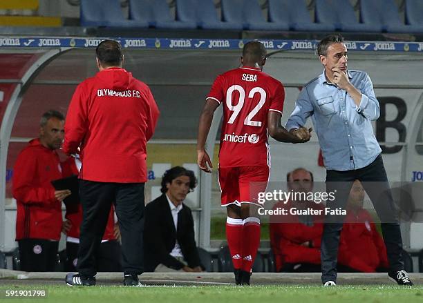 Olympiacos FC's head coach Paulo Bento congratulates Olympiacos FC's forward from Brazil Seba during the UEFA Europa League match between FC Arouca...