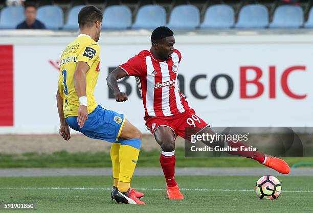 Olympiacos FC's forward from Nigeria Brown Ideye with FC Arouca's defender Hugo Basto in action during the UEFA Europa League match between FC Arouca...