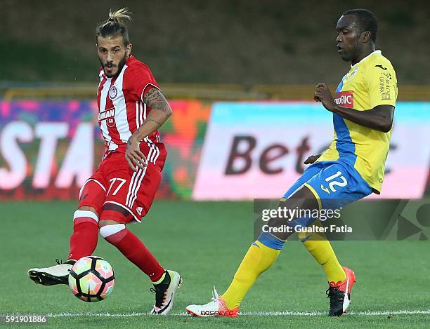 Olympiacos FC's defender from Portugal Diogo Figueiras with FC Arouca's forward from Angola Mateus in action during the UEFA Europa League match...